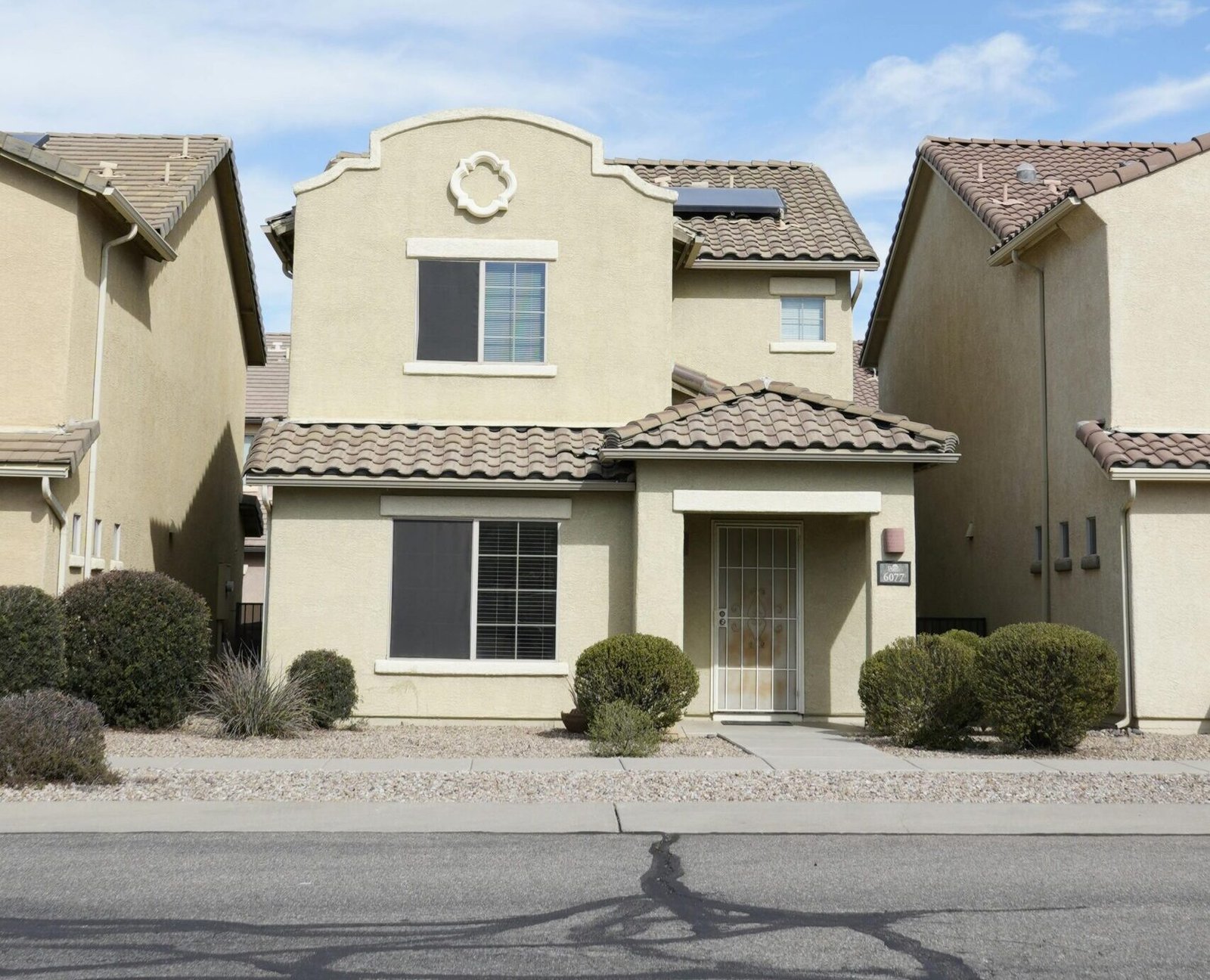 A beautiful residential house in a sunny Tucson suburb, highlighting southwestern architecture.